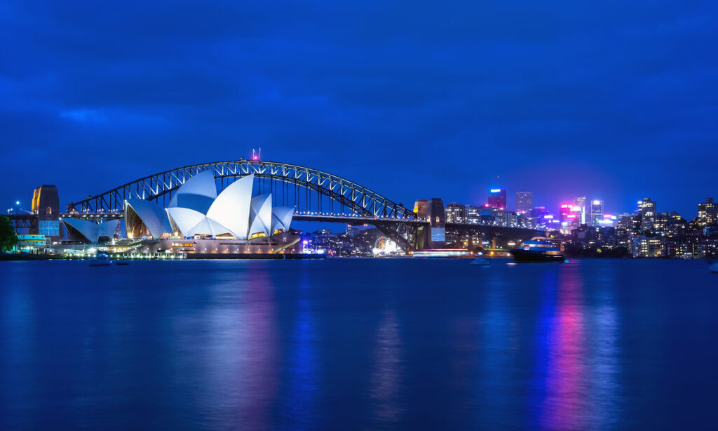 Opera House and Harbor Bridge at twilight.