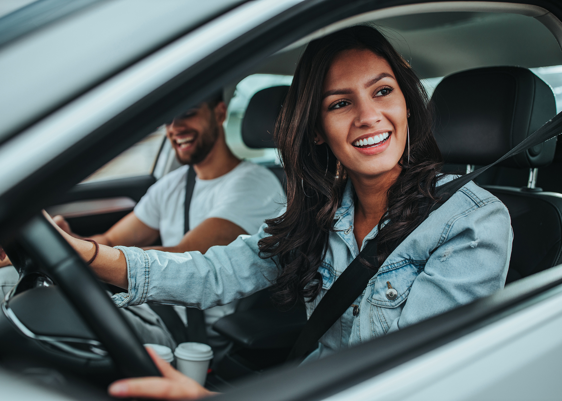 Young couple traveling by car