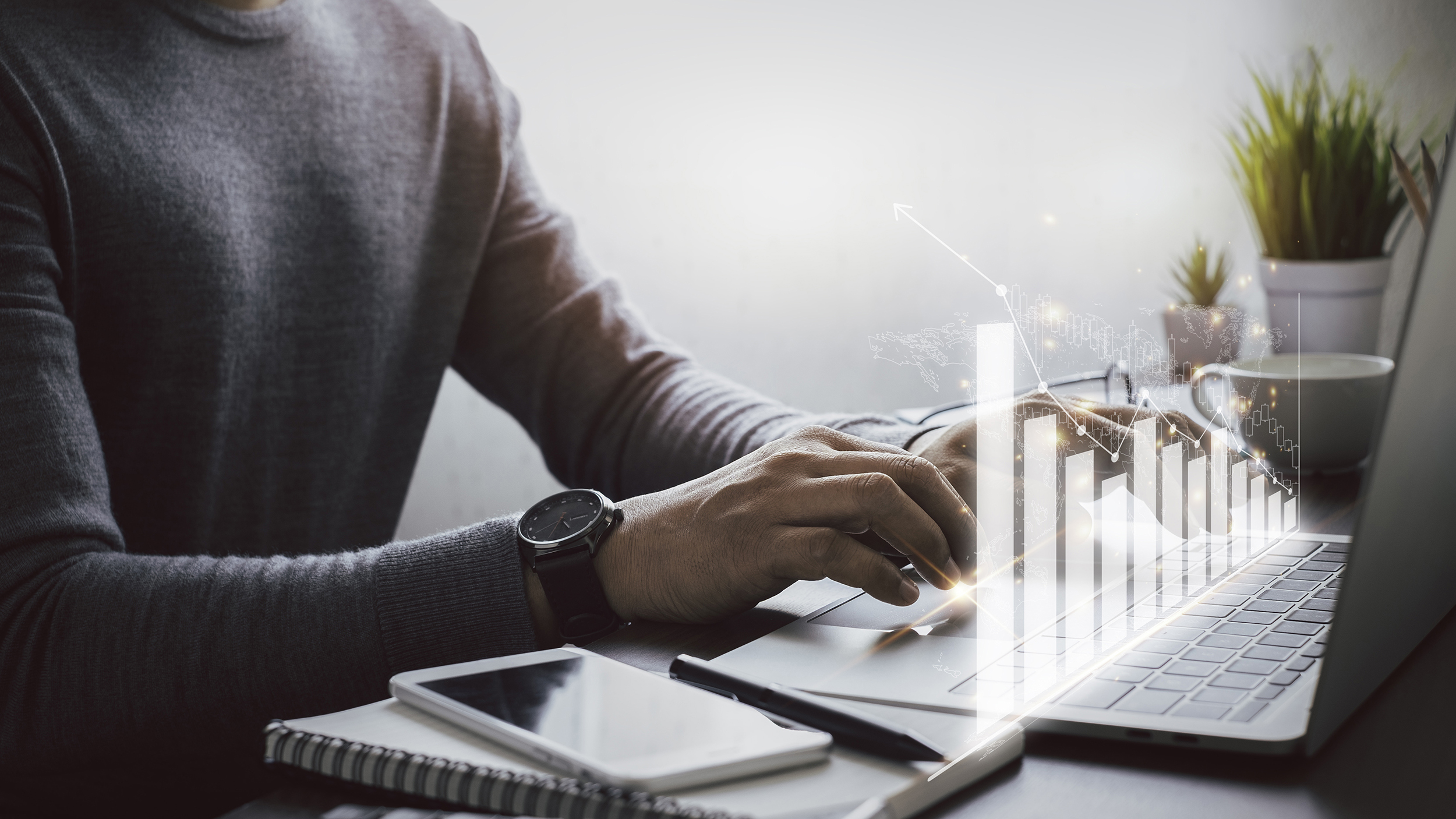 Businessman, hand using and typing keyboard of laptop computer analyzing sales data and economic growth plan graph chart success. Business finance and marketing digital technology concept.