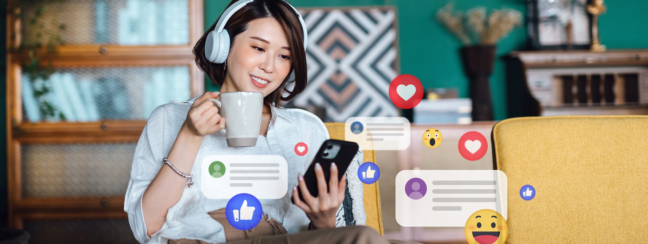 Beautiful young Asian woman with headphones relaxing at home and using smartphone, checking social media on mobile phone, receives notification, likes, views and comments. Youth lifestyle, social media and digital online. People network and technology