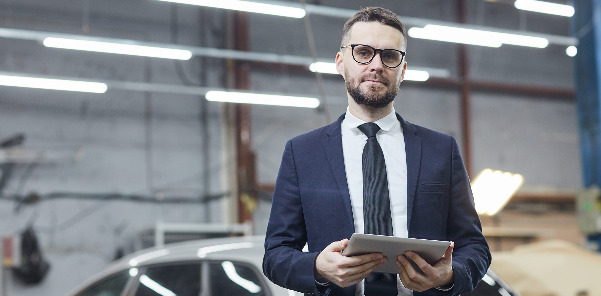 Modern Businessman In Auto Service Center