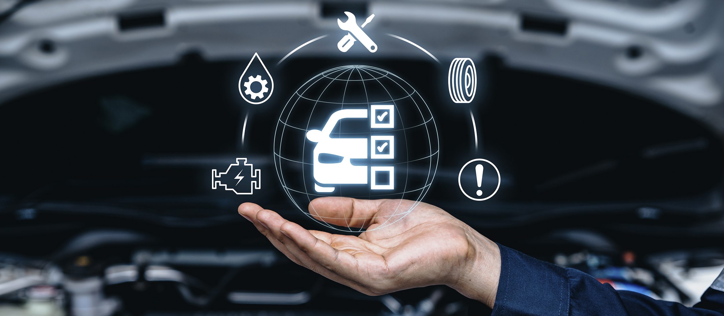 Hand of mechanic holding car service and checking.